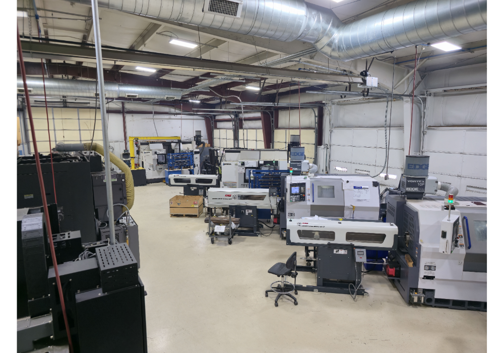 Wide view of Dynacut Manufacturing’s spotless CNC machine shop with multiple precision milling and turning centers